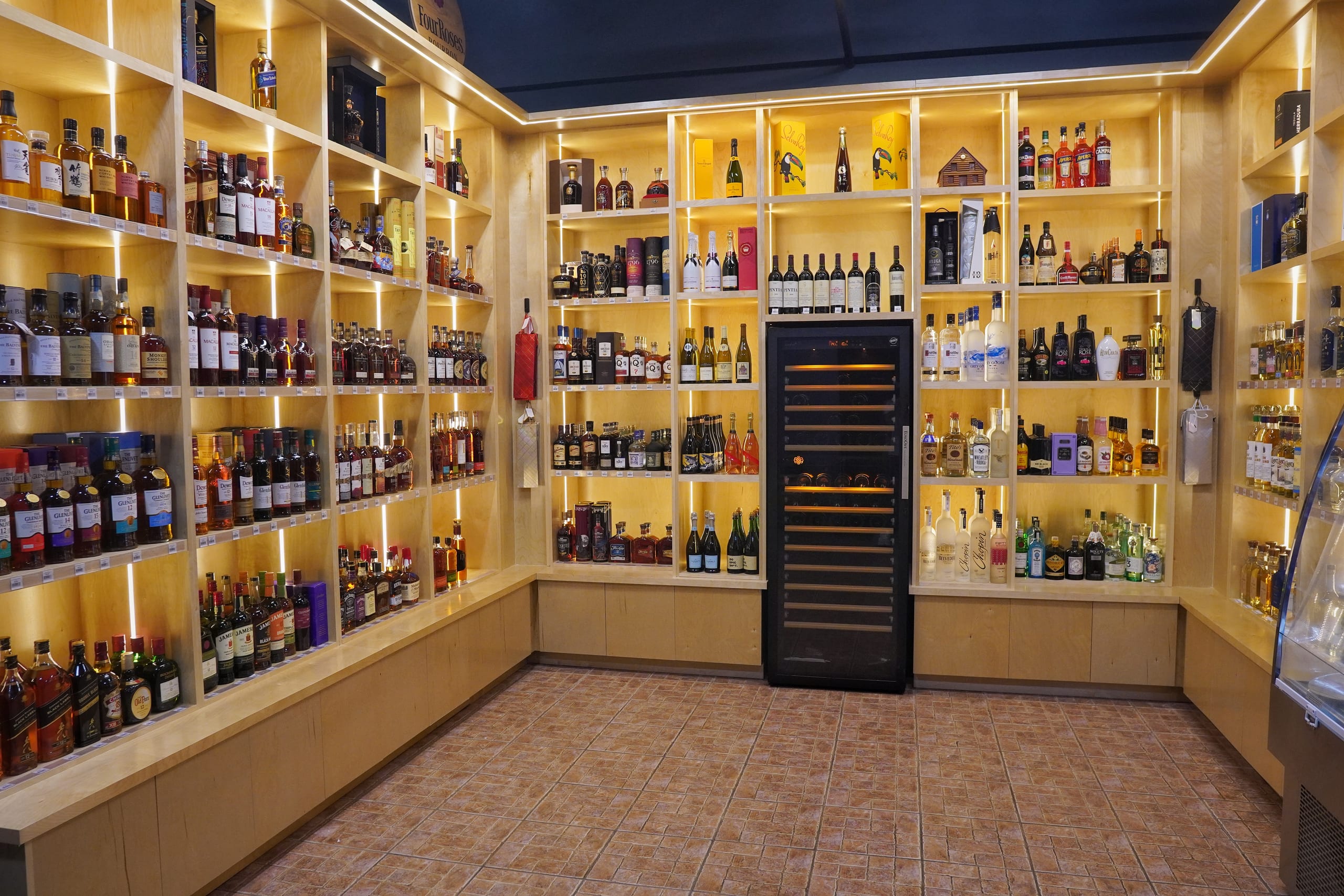 Shelves of whiskey, bourbon and tequila inside Sabor Havana Liquor Express in Doral, Miami